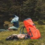 Orange waterproof backpack for multi-day trekking and watersports – Zulupack® Nomad 35L IP67